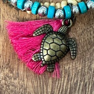 Beaded bracelet bundle with pink tassel and antique gold sea turtle charm